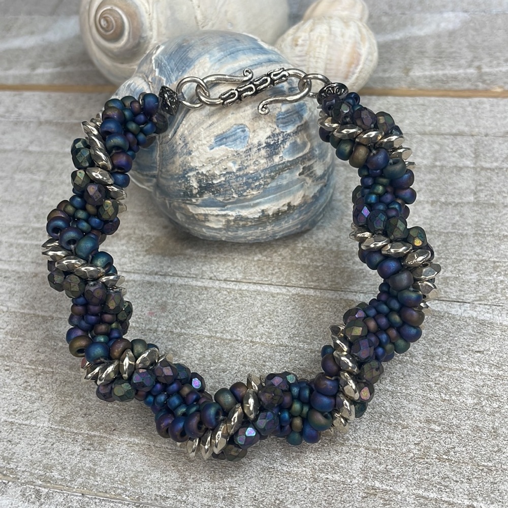 Silver disc  crocheted bracelet
